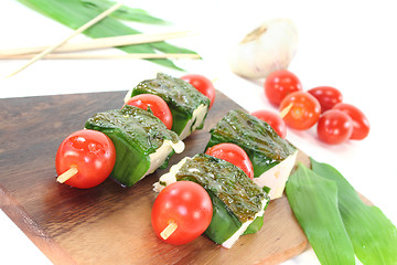 Image showing Feta cheese in wild garlic coat