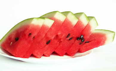 Image showing Slices of juicy watermelon served on white plate