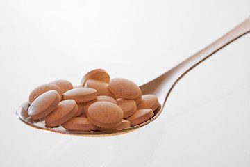 Image showing Spoonful of vitamins