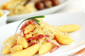 Image showing Rolled noodle with sour cabbage and bacon