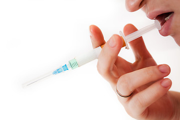 Image showing Syringe in a palm of the addict