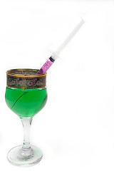 Image showing Syringe with poison in a glass
