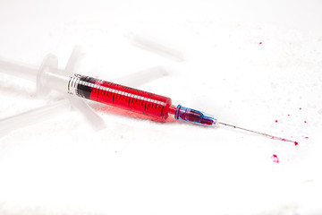 Image showing Syringe with poison
