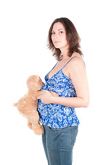 Image showing Portrait of pretty pregnant woman with toy