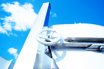 Image showing Industrial zone, Steel pipelines and valves against blue sky