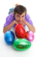 Image showing Child with colourful easter eggs