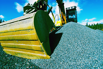 Image showing excavator against blue sky    