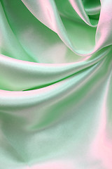 Image showing Smooth elegant green silk as background