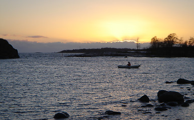 Image showing Gold Sea Sunset with Boat in Finland