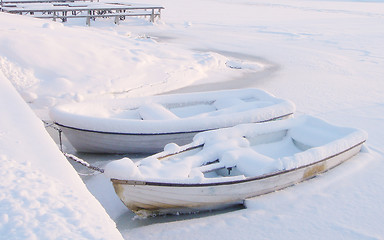 Image showing Winter Boats Under Snow In Finland           