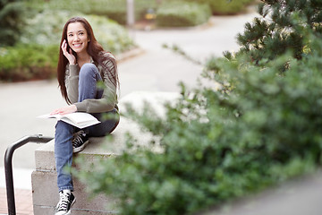 Image showing Ethnic student on the phone