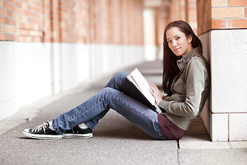 Image showing Ethnic college student studying