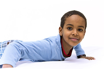 Image showing Portrait of a young boy raising his head