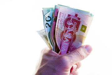 Image showing Fist full of Canadian Money