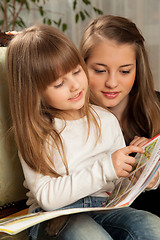 Image showing Two Sisters Reading