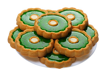 Image showing Cookies with green jelly on white plate, isolated