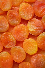 Image showing Dry apricots as background