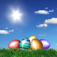 Image showing Easter eggs on green grass 