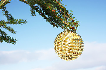 Image showing golden bauble on christmas tree