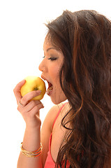 Image showing Girl eating apple.