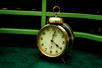 Image showing Old gold alarm clock