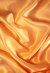 Image showing Smooth elegant gold satin as background