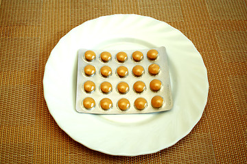 Image showing pills on the white plate