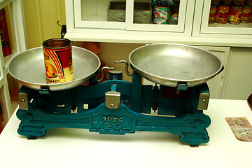 Image showing Blue old scales with a jar