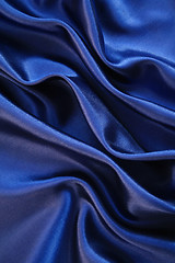 Image showing Smooth elegant dark blue silk as background 