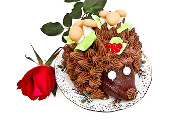 Image showing Cake in the form of a hedgehog with a rose