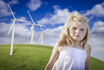Image showing Beautiful Young Girl and Wind Turbine Field