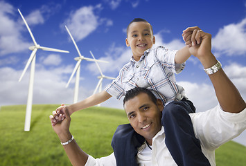 Image showing Happy Hispanic Father and Son with Wind Turbine