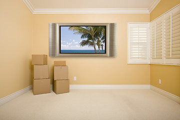 Image showing Flat Panel Television on Wall in Empty Room with Boxes