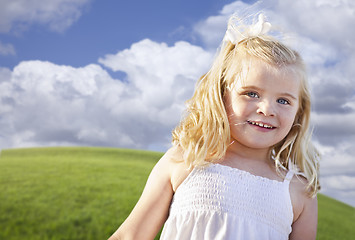 Image showing Adorable Blue Eyed Girl Playing Outside