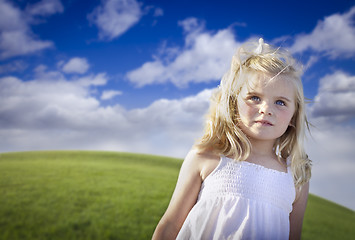 Image showing Adorable Blue Eyed Girl Playing Outside