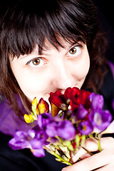 Image showing woman with purple flower