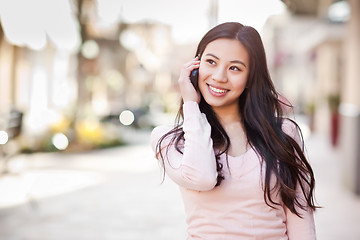 Image showing Asian woman on the phone