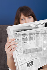 Image showing Reading the newspaper