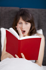 Image showing Reading a book