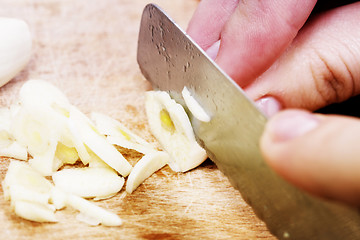 Image showing Chopping the Garlic