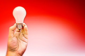 Image showing Background with lit lightbulb