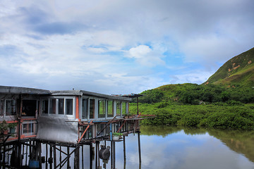 Image showing wood house on the water