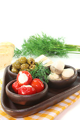 Image showing olives, stuffed peppers and mushrooms