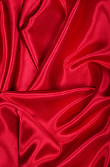 Image showing Smooth elegant red silk as background 