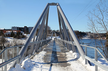 Image showing People walking on the bridge.