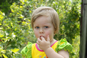 Image showing Little girl in the garden