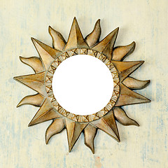 Image showing Bronze sun frame