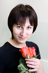 Image showing Smiling girl with roses