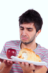 Image showing young man food temptation
