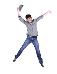 Image showing Happy young man jump